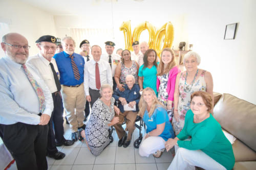 Former Governor Athelstan Charles Long celebrates his 100th birthday in the company of family, friends and Cayman’s current governor, Martyn Roper. – Photos: Alvaro Serey
